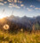 Bild einer Bergkette von einem Feld aus gesehen